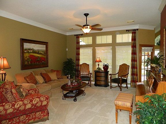 Large formal living room with views to the backyard.