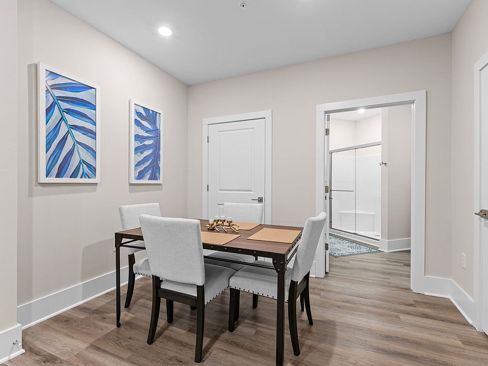 Active Adult dining room with a wooden table and chairs