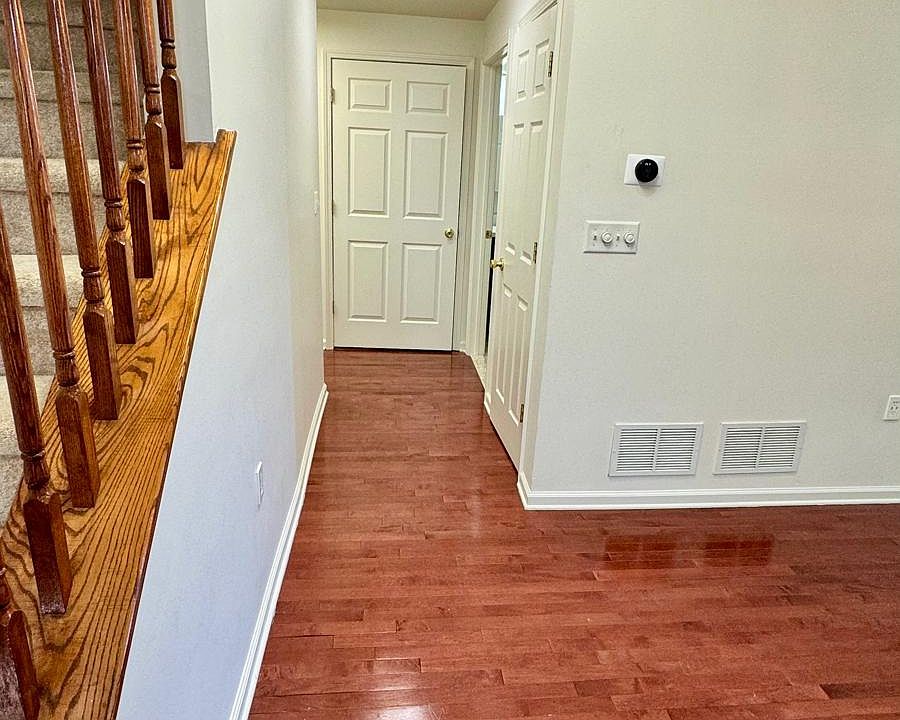 Way to Foyer from Living Room - Washer/Dryer Unit & BathRoom