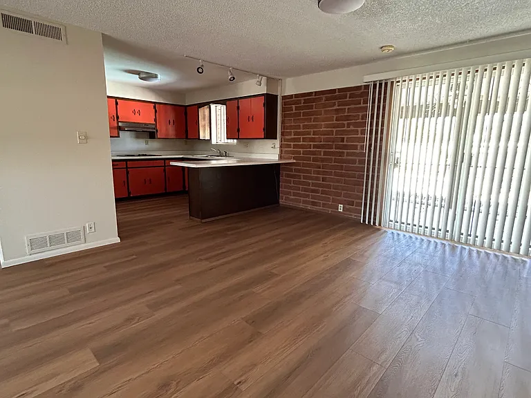 Dining area with view into kitchen