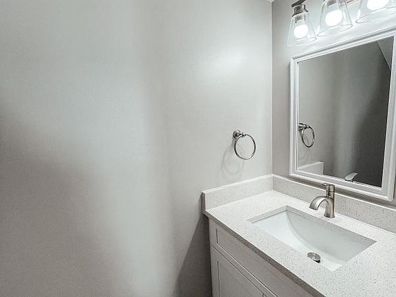 Downstairs half bathroom.