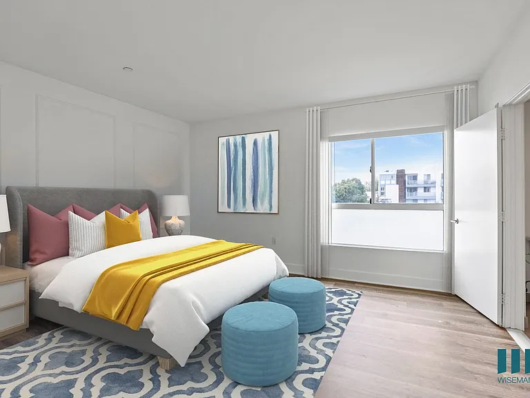 Spacious Bedroom with Large Windows, Vinyl Flooring, and Bathroom
