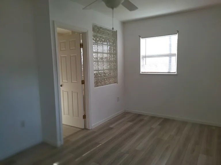 Bedroom 2 / office with door to bathroom.