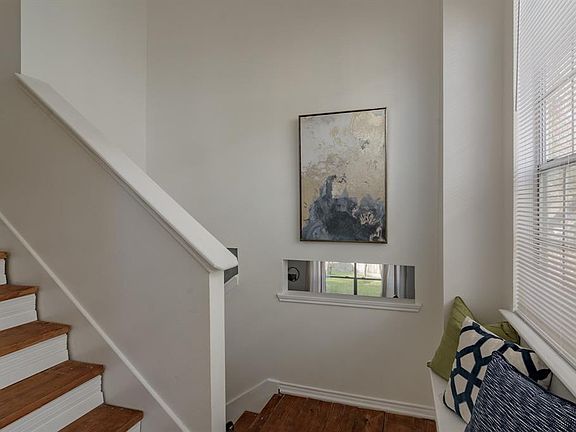 Guests will step inside this tall, dramatic and inviting entry.