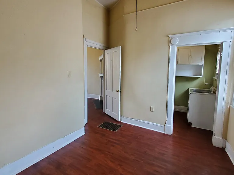 Bedroom view to kitchen and living room