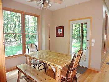 The dining area is open to the kitchen and great room.br /The open floor plan makes for enjoyable easy living and br /welcomes company or family gatherings.