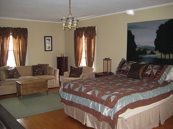 Huge Master w/ sitting area and his and her closets