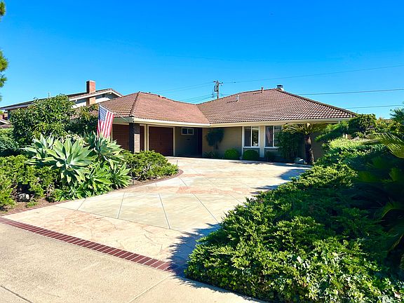 Front Driveway leading to House. Landscaping included in Lease.