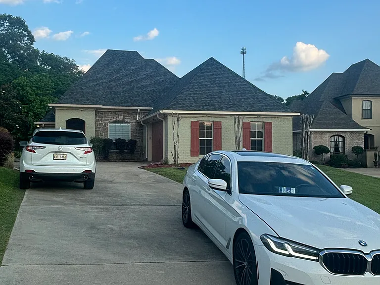 Two car garage with driveway parking for 3.