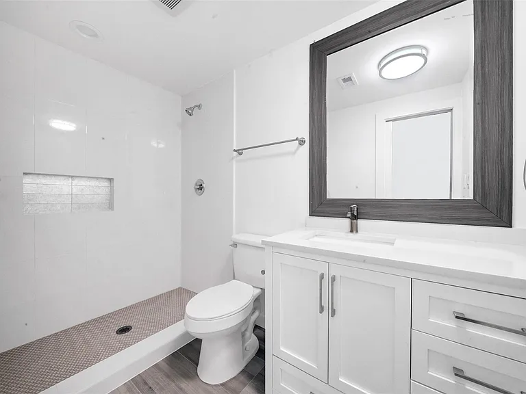 129 E 31st 1/2 St — Photo 17