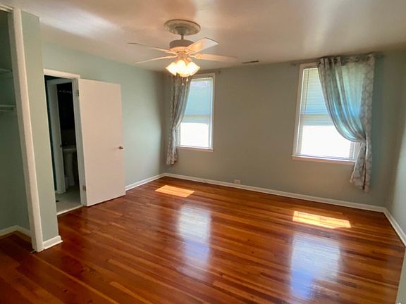 Bright and airy bedroom #2 with dual closets and entrance into jack & jill bathroom