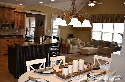 View from kitchen looking at hearth room