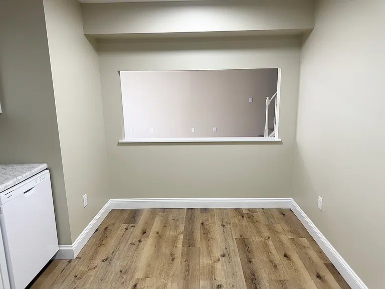 KITCHEN PASS THROUGH TO FAMILY / DINING AREA.