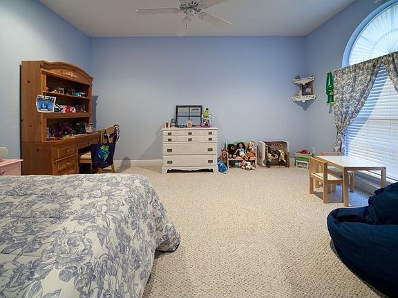 One of the SIX bedrooms features a walk-in closet.