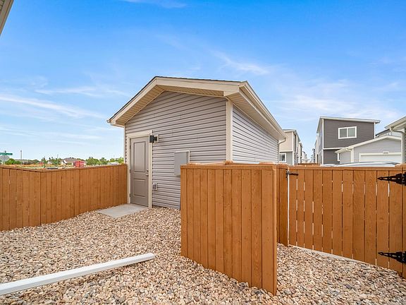 View of Garage and Backyard