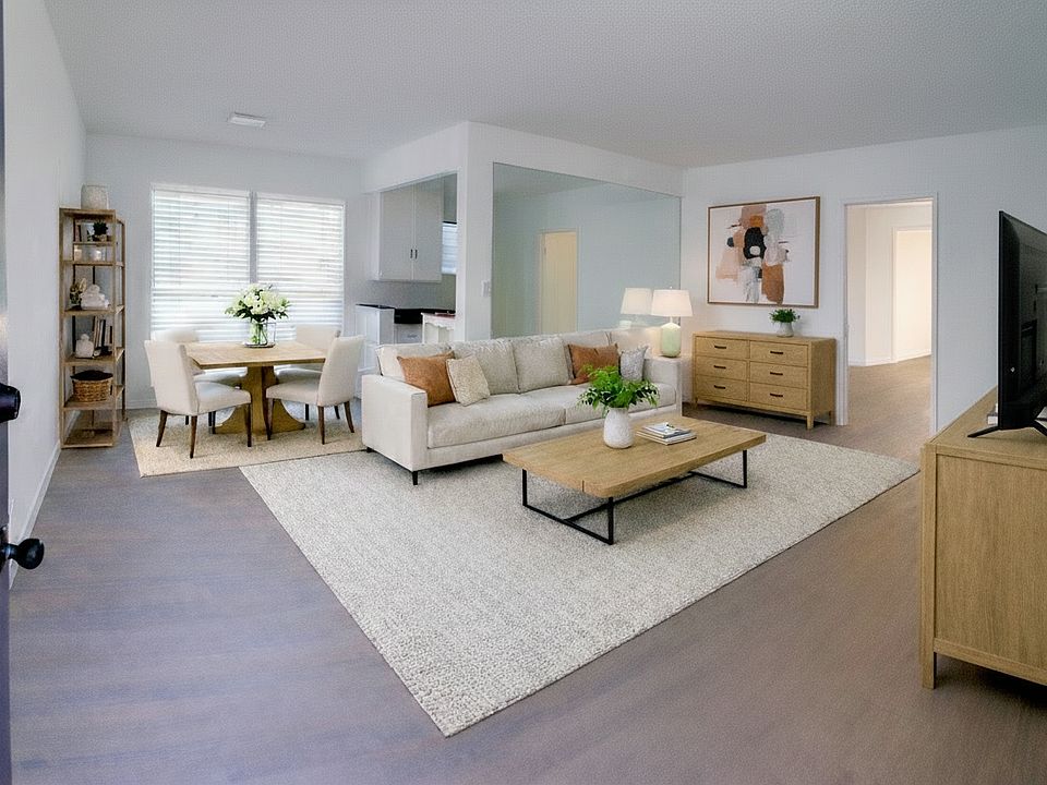 Spacious living and dining room. Brand new laminate wood flooring on entire unit.