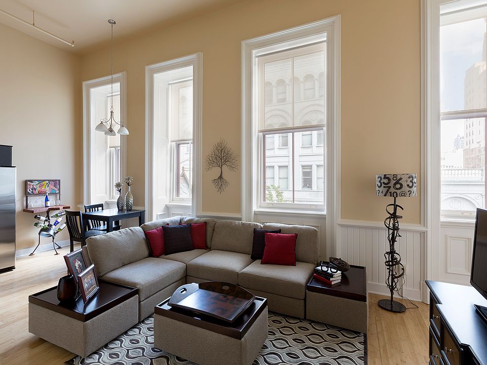 Massive windows, wood floors