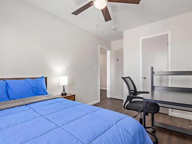 With desk and closet.