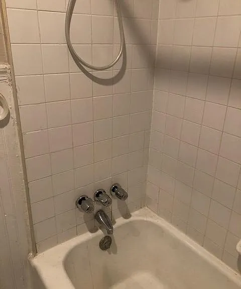 Tiled Bathroom Wall with new bathtub hardware
