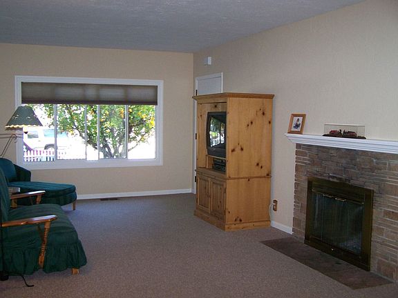 Spacious Living Room with Fireplace