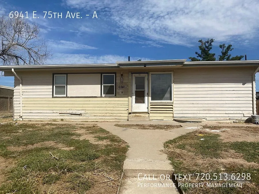 Building Photo - 6941 E 75th Ave #A