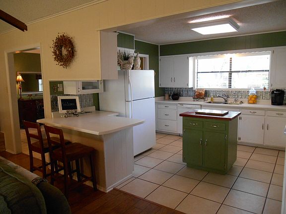 Kitchen with eat in bar area