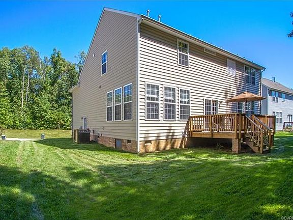 Rear view of home and deck