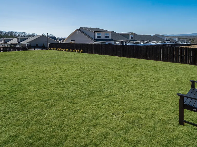 Dog park with plenty of open space for your fury friends to play along with seating for the owners.