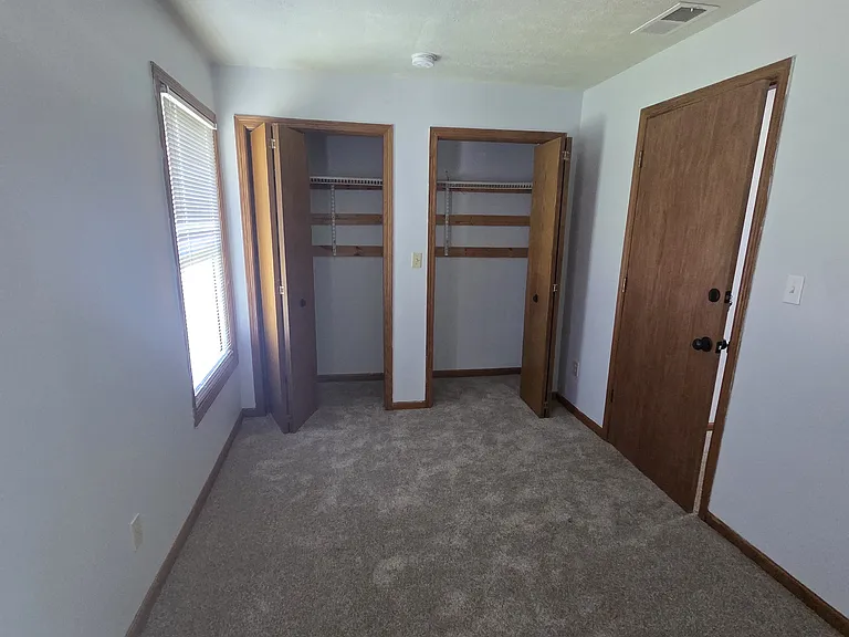 2nd Floor Bedroom #6 with Dual Bi-Fold Closets & Built-In Shelving