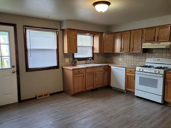 Kitchen exits to rear. Approx 14 X 12