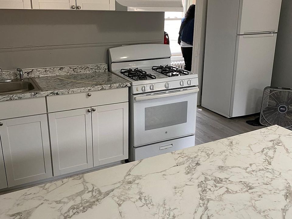 Fresh new kitchen with new cabinets, sink, countertop