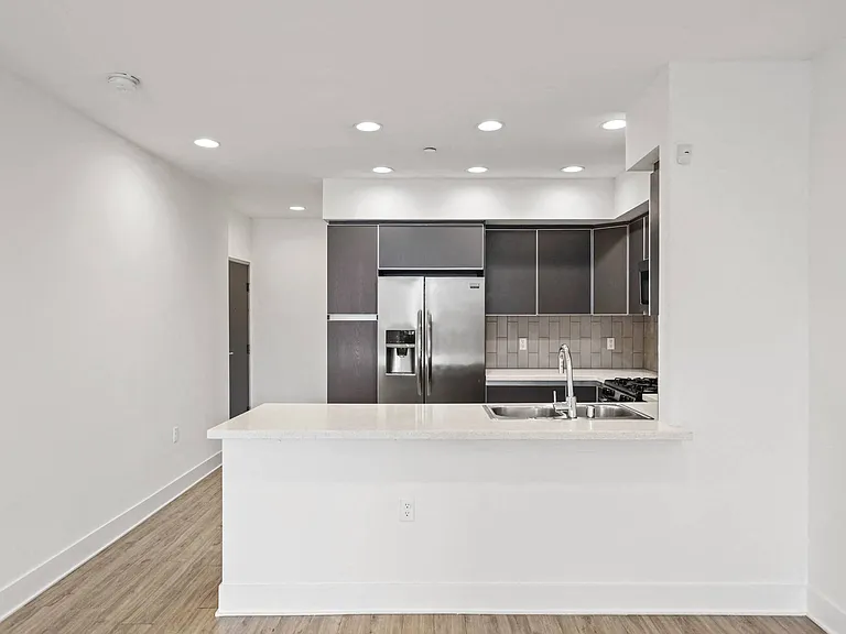 Front Entrance and Kitchen with Refrigerator