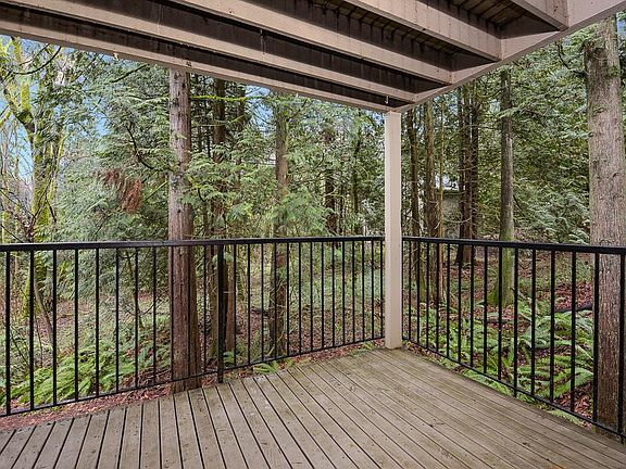 Spacious deck overlooking the privacy of nature.