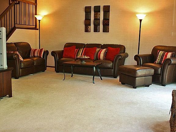 The living room walks out to the large deck 