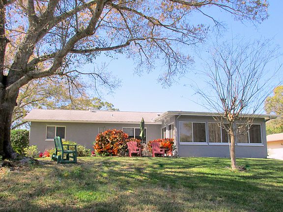 Rear view w/ patio