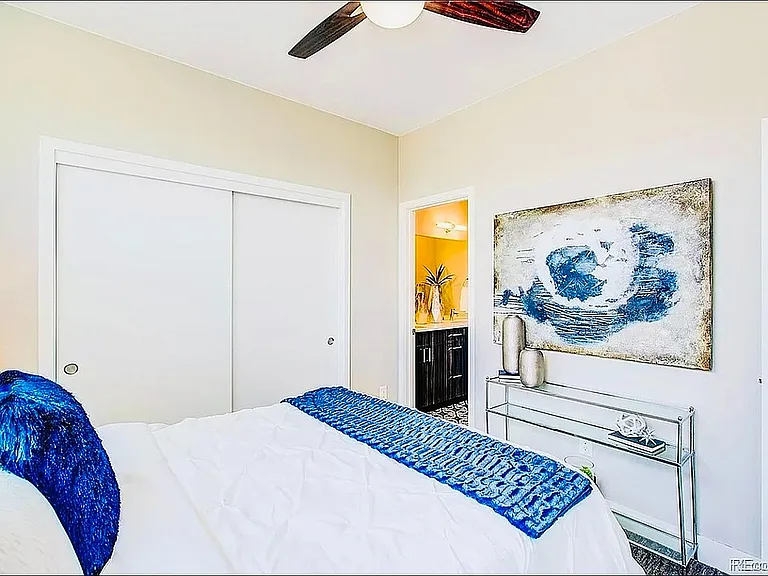 Experience modern elegance in this beautifully designed bedroom with direct bathroom access.