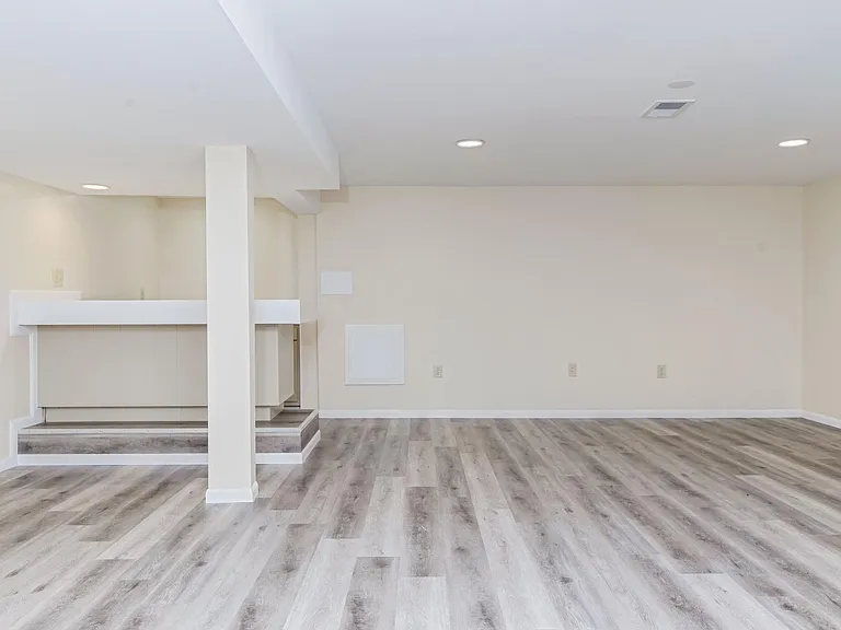 Basement family room with entertainment bar area