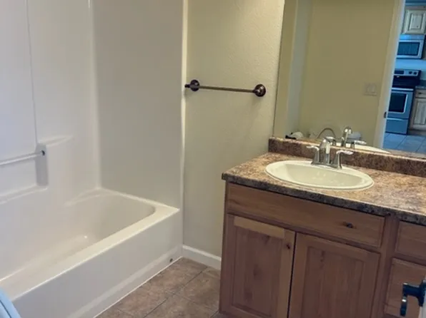 Three Bedroom Two Bathroom Apartment, VERY near CMU, $2100 per month, plus $100 a rmonth gas copay., 1808-1816 N 7th St #47d599e66, Grand Junction, CO 81501