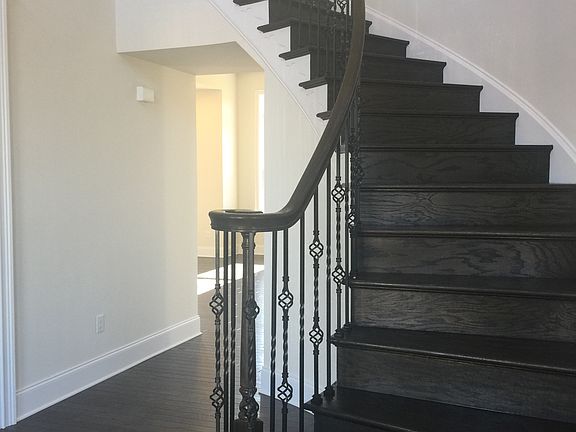 Gorgeous curved staircase!