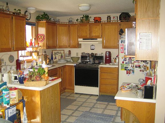 Kitchen has tons of cabinet space