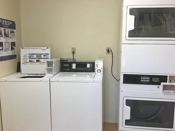 The building has a laundry room with 2 HE washers and dryers.