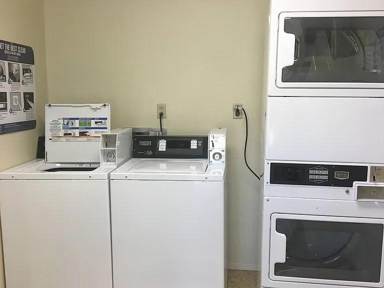 The building has a laundry room with 2 HE washers and dryers.
