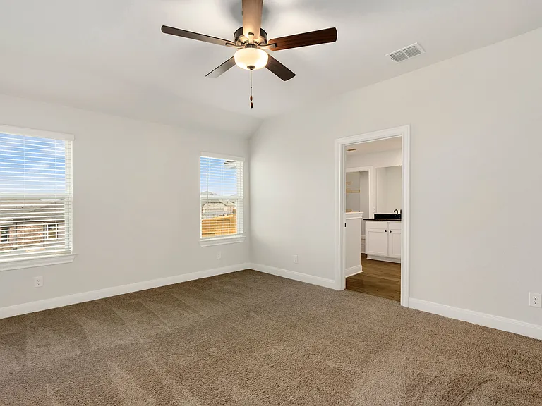 The master bedroom has its own bathroom and walk-in closet.