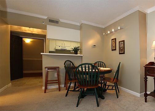 Wonderful Eat-In Area w/Track Lighting & Two Additional Seating at the Counter