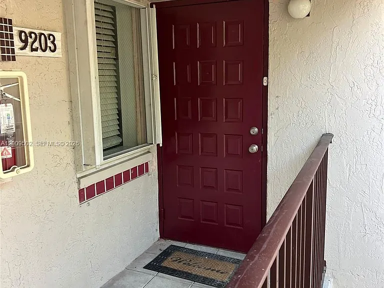 9203 SW 138th Pl #9203 — Photo 1