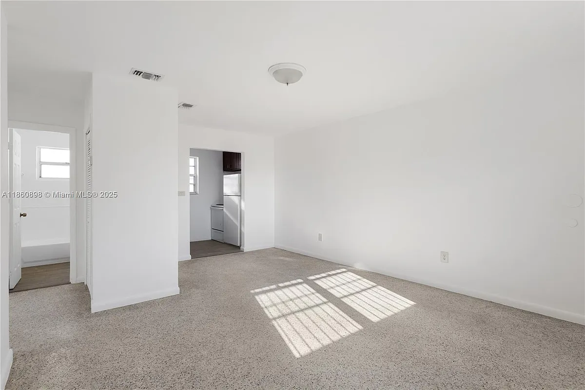 Building Photo - 1251 NW 59th St #3
