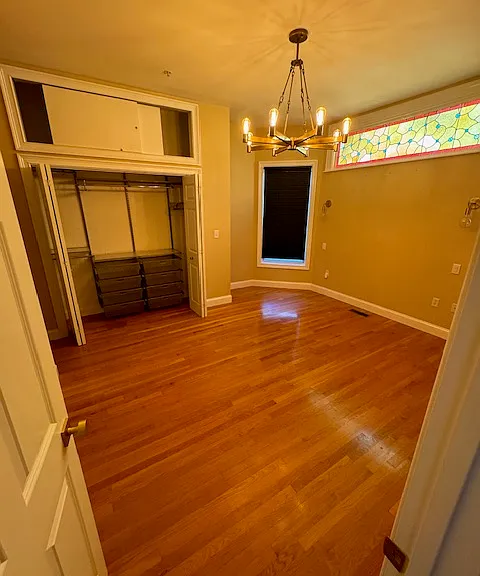 Room has been updated to include overhead light, bedside sconces and closet lighting.