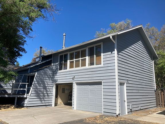 Two car garage in back with gated entry off private alleyway