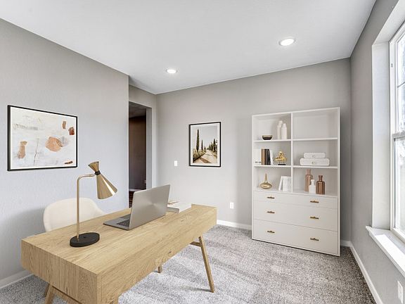 The private den is separated from the main living areas of the house and is perfect for an at home o