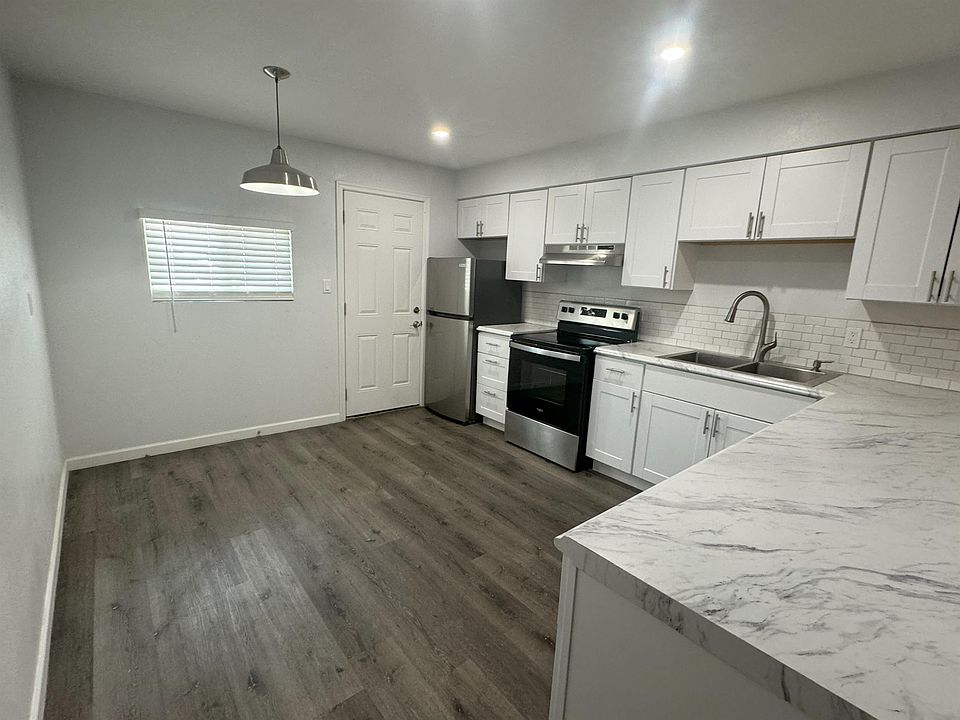 Back Door Entry and Dining Area in Kitchen.